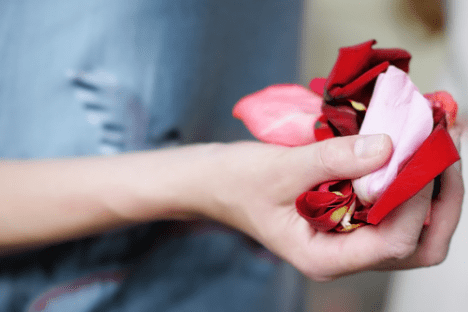 Rose petals at burial ceremony