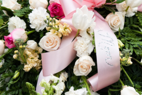 a burial by boat bouquet of flowers