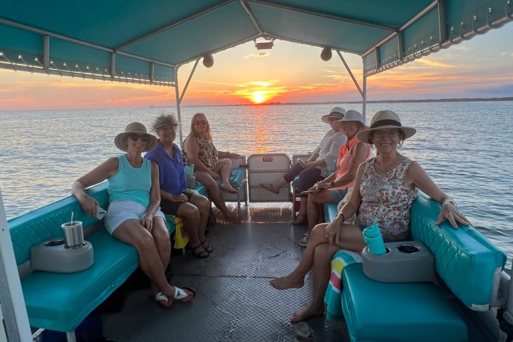 A private sunset dolphin cruise on Pensacola Beach.