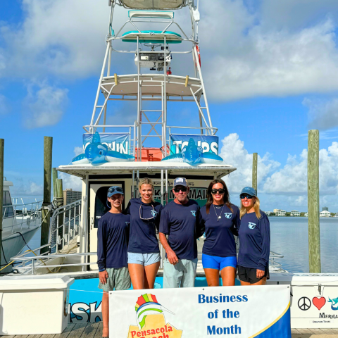 Mermaid Crew posing for April Business of the Month Banner