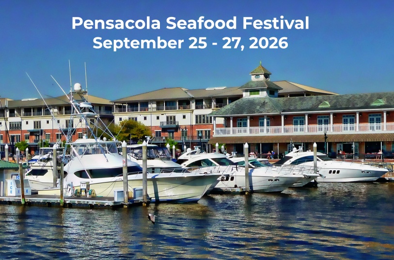 Boats docked near waterfront buildings under blue sky, text: Pensacola Seafood Festival, September 25-27, 2026.